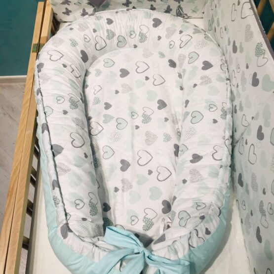 zasitnie bortiki v krovatku rebenka