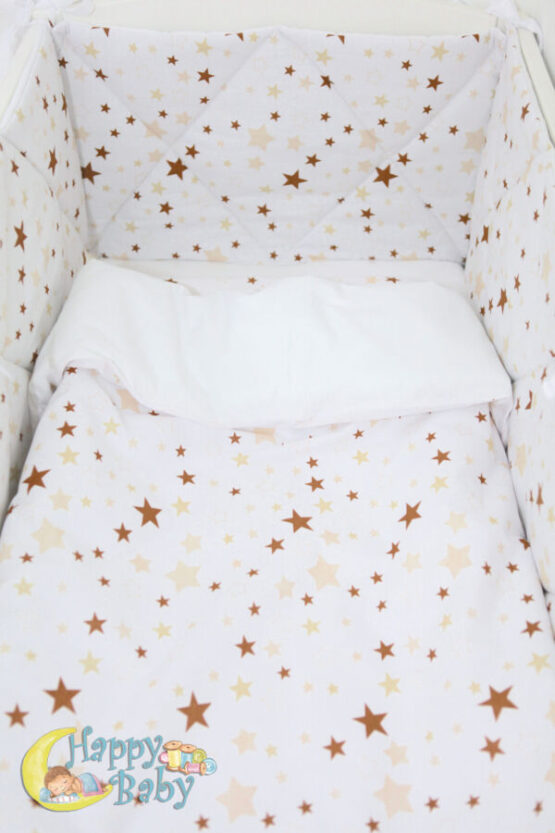 posteli v krovatku novorojdennogo