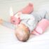 Pernuta pozitionator anti-rasucire pentru bebelusi BabyJem Roz, 34x36 cm